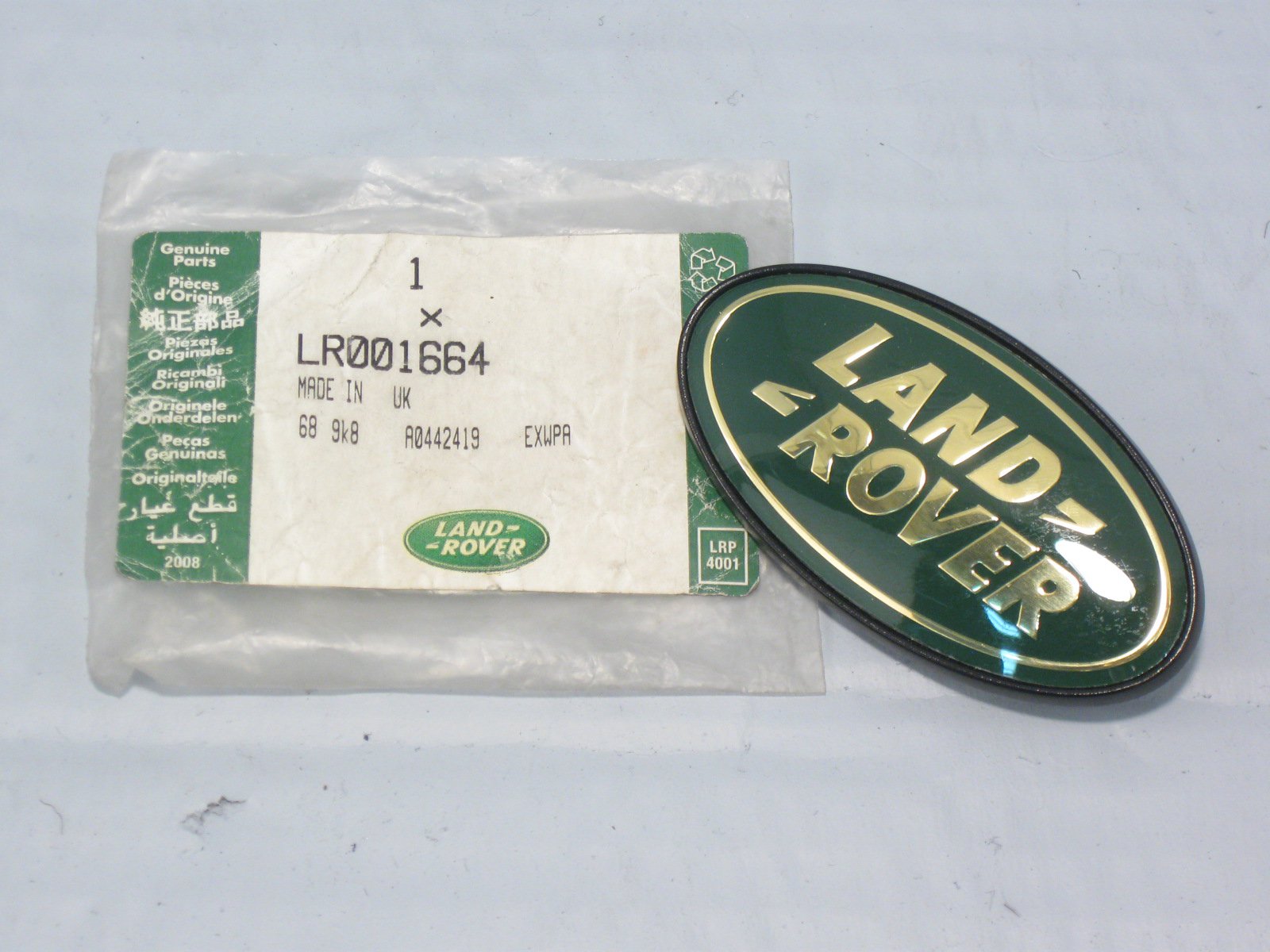 LR001664 LAND ROVER Эмблема боковая FR2